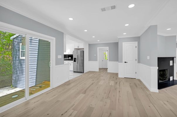 Empty room, Fireplace, Interior, Kitchen, Recessed Lighting, Wood Texture Flooring