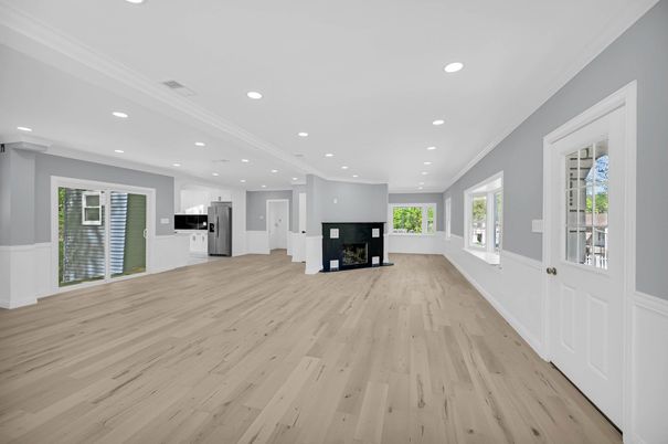 Empty room, Fireplace, Interior, Kitchen, Recessed Lighting, Wood Texture Flooring