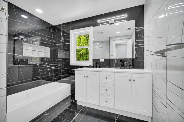 Bathroom, Dual Sink Vanities, Glass Shower, Interior, Marble Walls, Recessed Lighting