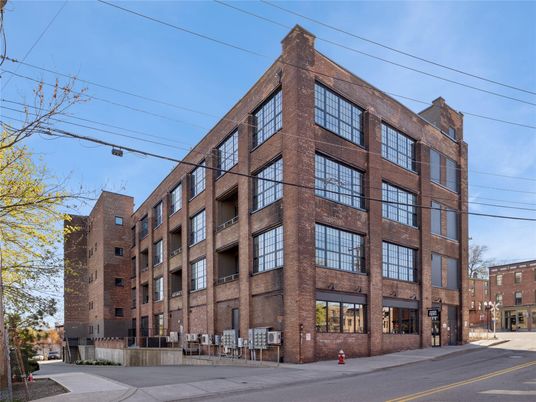 Exterior, Facade, Brick Facade, Condo Building