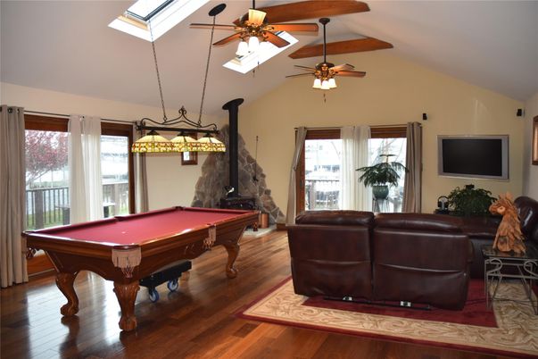 Billiard Table, Fireplace, Game Room, Interior, Pendant Lights, Wood Texture Flooring