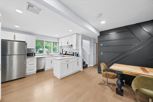 Interior, Kitchen, Recessed Lighting, Stainless Steel Appliances, Wood Texture Flooring