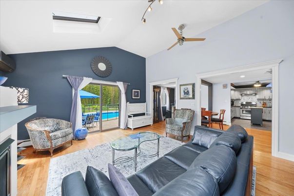 Fireplace, Interior, Kitchen, Living room, Recessed Lighting, Stainless Steel Appliances, Wood Texture Flooring