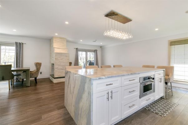 Dining room, Interior, Kitchen, Pendant Lights, Recessed Lighting, Stainless Steel Appliances, Wood Texture Flooring