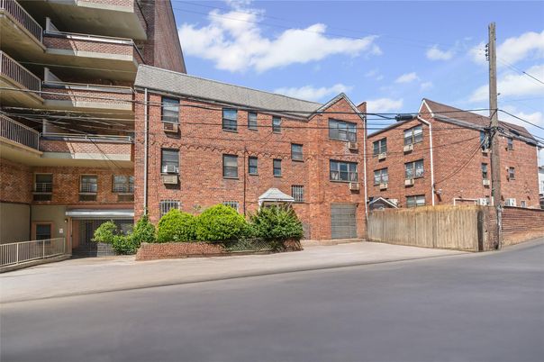 Exterior, Facade, Brick Facade, Condo Building