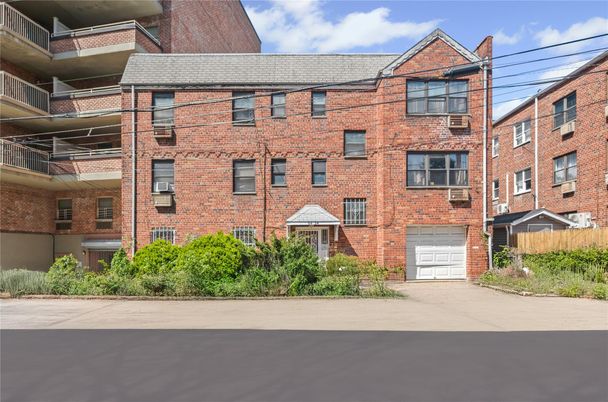 Attached, Exterior, Facade, Brick Facade, Condo Building