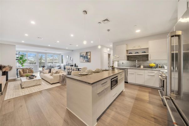 Dining room, Interior, Kitchen, Living room, Pendant Lights, Recessed Lighting, Stainless Steel Appliances, Wood Texture Flooring