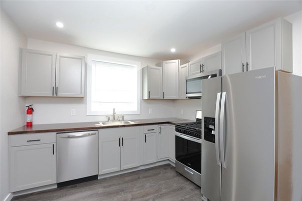 Interior, Kitchen, Recessed Lighting, Stainless Steel Appliances, Wood Texture Flooring