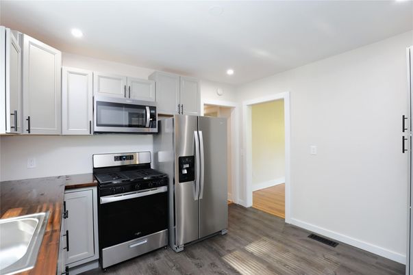 Interior, Kitchen, Recessed Lighting, Stainless Steel Appliances, Wood Texture Flooring