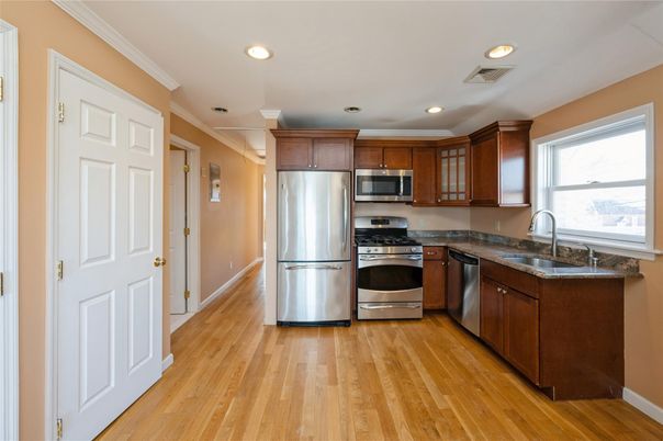 Interior, Kitchen, Recessed Lighting, Stainless Steel Appliances, Wood Texture Flooring