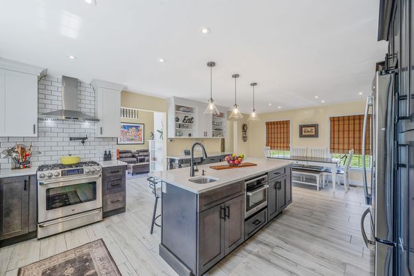 Dining room, Interior, Kitchen, Pendant Lights, Recessed Lighting, Stainless Steel Appliances, Wood Texture Flooring