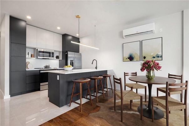 Dining room, Interior, Kitchen, Pendant Lights, Recessed Lighting, Stainless Steel Appliances, Wood Texture Flooring