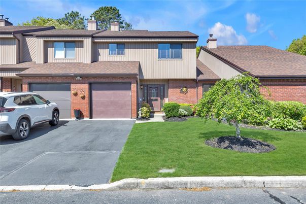 Attached, Exterior, Facade, Brick Facade, Modern