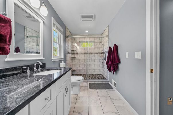 Bathroom, Dual Sink Vanities, Glass Shower, Interior, Marble, Recessed Lighting