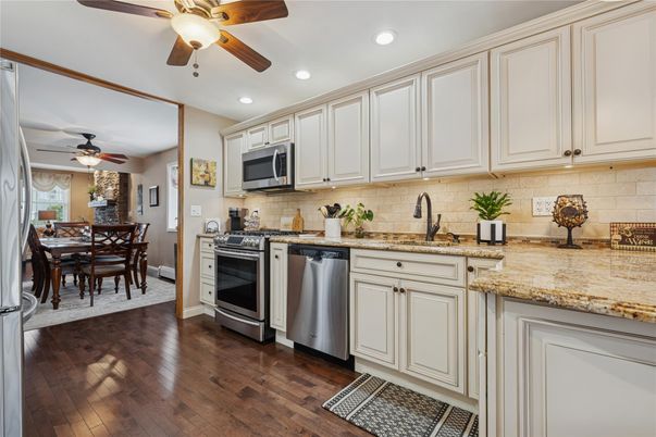 Dining room, Interior, Kitchen, Recessed Lighting, Stainless Steel Appliances, Wood Texture Flooring