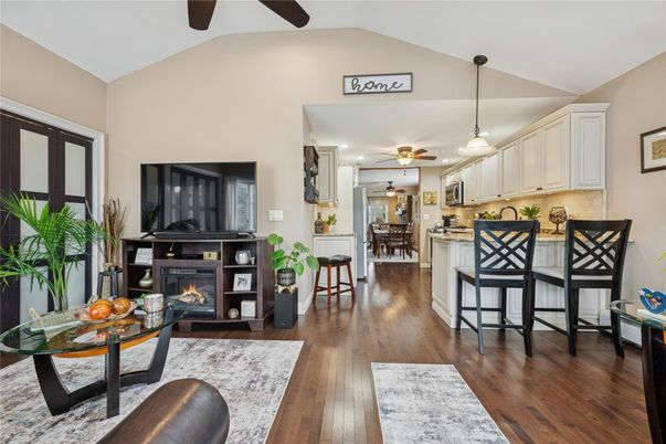 Dining room, Fireplace, Interior, Kitchen, Pendant Lights, Recessed Lighting, Wood Texture Flooring