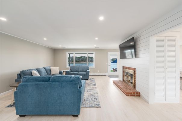 Fireplace, Interior, Living room, Recessed Lighting, Wood Texture Flooring