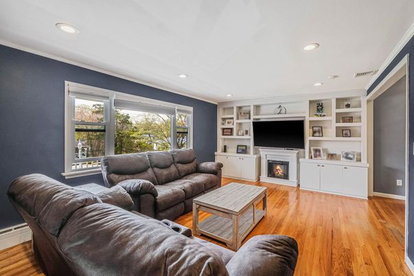 Fireplace, Interior, Living room, Recessed Lighting, Wood Texture Flooring
