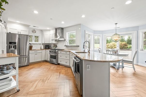 Dining room, Interior, Kitchen, Pendant Lights, Recessed Lighting, Stainless Steel Appliances, Wood Texture Flooring