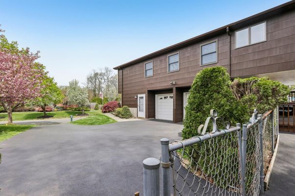 Attached, Exterior, Facade, Raised Ranch