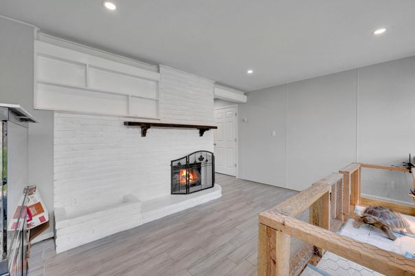 Fireplace, Interior, Recessed Lighting, Wood Texture Flooring