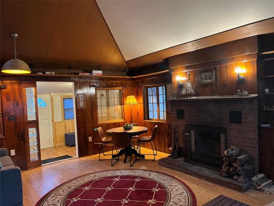 Dining room, Fireplace, Interior, Pendant Lights, Wood Texture Flooring, Wooden Walls