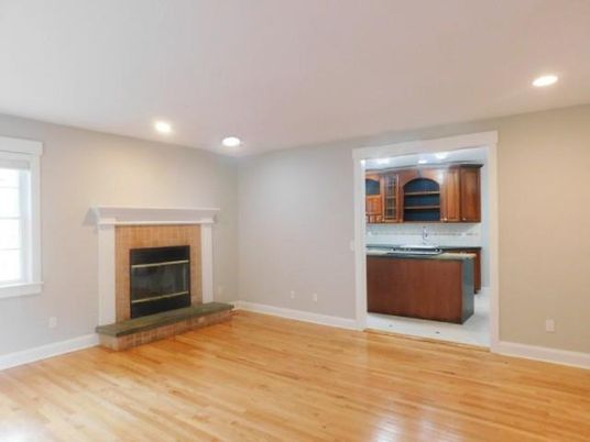 Empty room, Fireplace, Interior, Kitchen, Recessed Lighting, Wood Texture Flooring