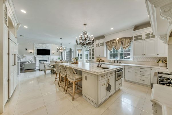 Chandelier, Dining room, Fireplace, Interior, Kitchen, Living room, Recessed Lighting, Stainless Steel Appliances