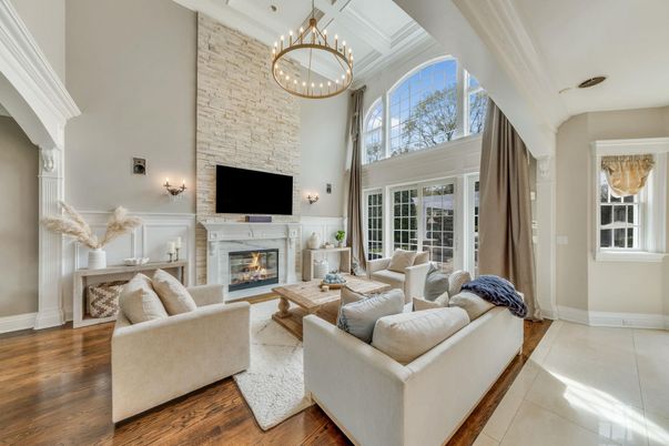 Chandelier, Fireplace, Interior, Living room, Pendant Lights, Stone Walls, Wood Texture Flooring