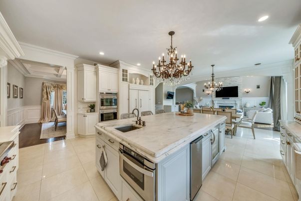 Chandelier, Dining room, Fireplace, Interior, Kitchen, Living room, Recessed Lighting, Stainless Steel Appliances