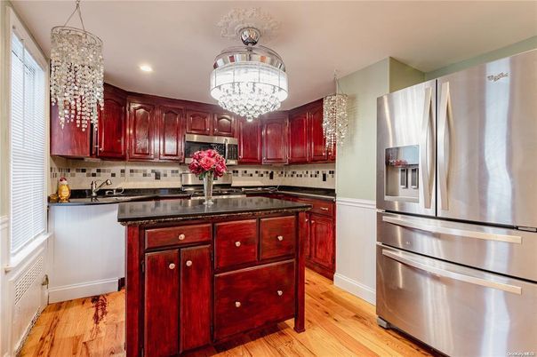 Chandelier, Interior, Kitchen, Pendant Lights, Recessed Lighting, Stainless Steel Appliances, Wood Texture Flooring