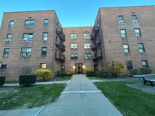 Exterior, Facade, Brick Facade, Condo Building