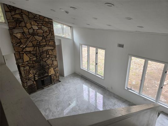 Empty room, Fireplace, Interior, Marble, Recessed Lighting, Stone Walls
