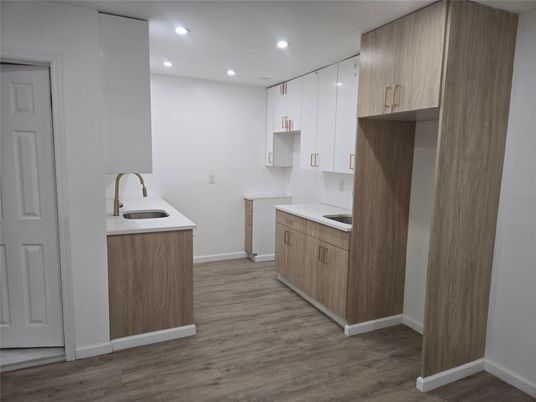 Interior, Kitchen, Recessed Lighting, Washer, Wood Texture Flooring