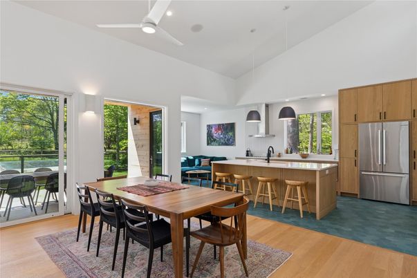 Dining room, Interior, Kitchen, Pendant Lights, Recessed Lighting, Stainless Steel Appliances, Wood Texture Flooring