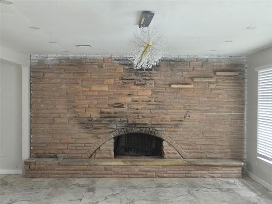 Fireplace, Interior, Marble, Recessed Lighting, Stone Walls