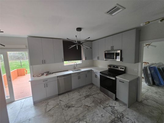 Interior, Kitchen, Marble, Pendant Lights, Stainless Steel Appliances