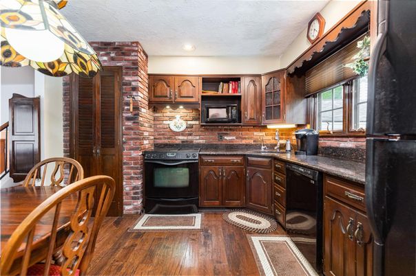 Fireplace, Interior, Kitchen, Recessed Lighting, Stone Walls, Wood Texture Flooring