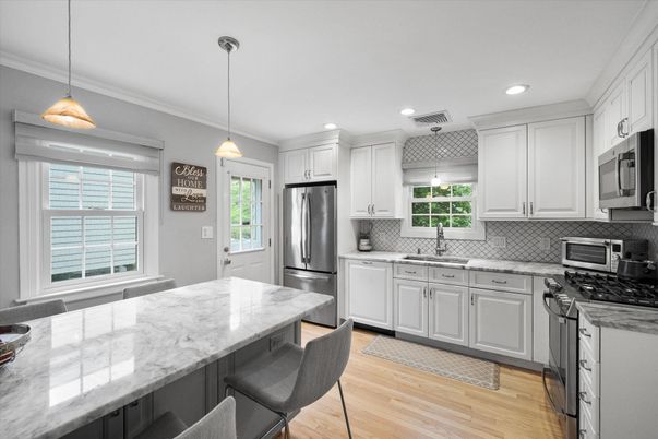 Interior, Kitchen, Pendant Lights, Recessed Lighting, Stainless Steel Appliances, Wood Texture Flooring