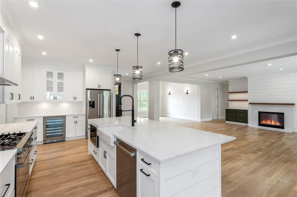 Fireplace, Interior, Kitchen, Pendant Lights, Recessed Lighting, Stainless Steel Appliances, Wood Texture Flooring