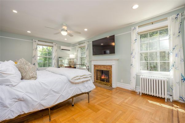 Bedroom, Fireplace, Interior, Recessed Lighting, Wood Texture Flooring
