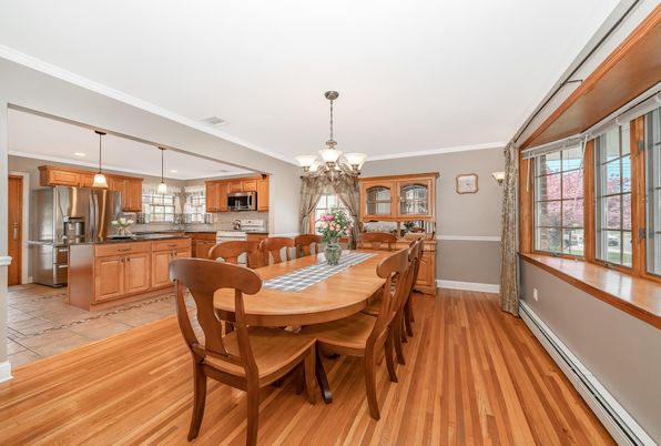 Chandelier, Dining room, Interior, Kitchen, Pendant Lights, Stainless Steel Appliances, Wood Texture Flooring