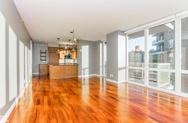 Empty room, Interior, Kitchen, Pendant Lights, Stainless Steel Appliances, Wood Texture Flooring