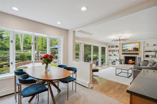 Dining room, Fireplace, Interior, Living room, Pendant Lights, Recessed Lighting, Wood Texture Flooring