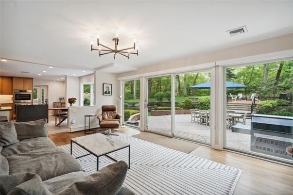 Chandelier, Dining room, Interior, Kitchen, Living room, Recessed Lighting, Stainless Steel Appliances, Wood Texture Flooring