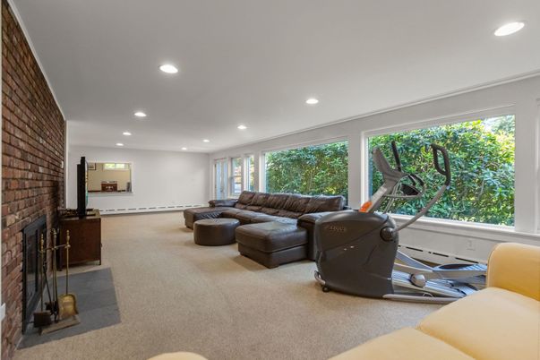 Fireplace, Fitness Equipment, Interior, Living room, Recessed Lighting, Stone Walls