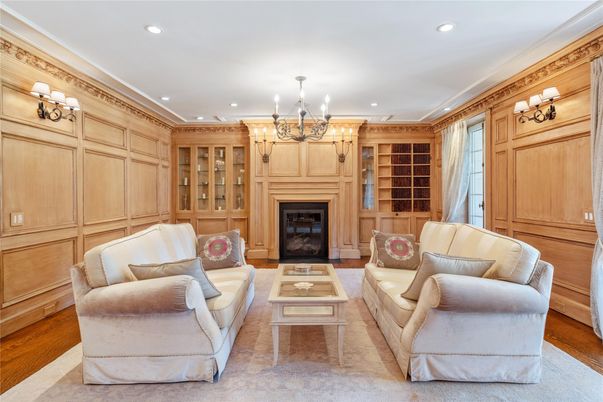 Chandelier, Fireplace, Interior, Living room, Recessed Lighting, Wood Texture Flooring, Wooden Walls