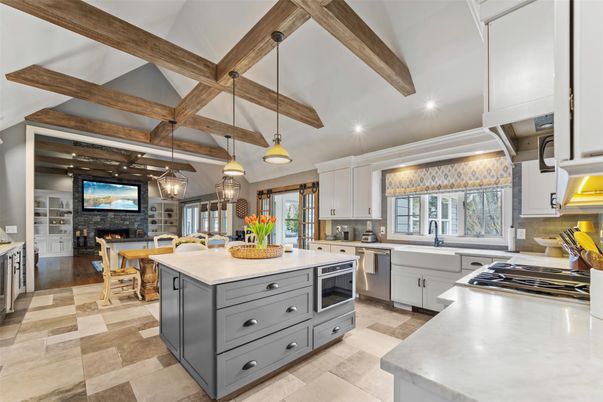 Fireplace, Interior, Kitchen, Pendant Lights, Recessed Lighting, Stainless Steel Appliances, Stone Walls, Wooden Beams
