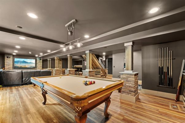 Billiard Table, Game Room, Interior, Pendant Lights, Recessed Lighting, Stone Walls, Wood Texture Flooring