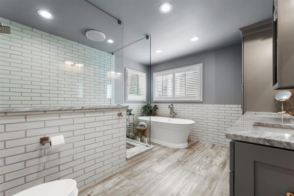 Bathroom, Dual Sink Vanities, Free Standing Baths, Interior, Pendant Lights, Recessed Lighting, Wood Texture Flooring